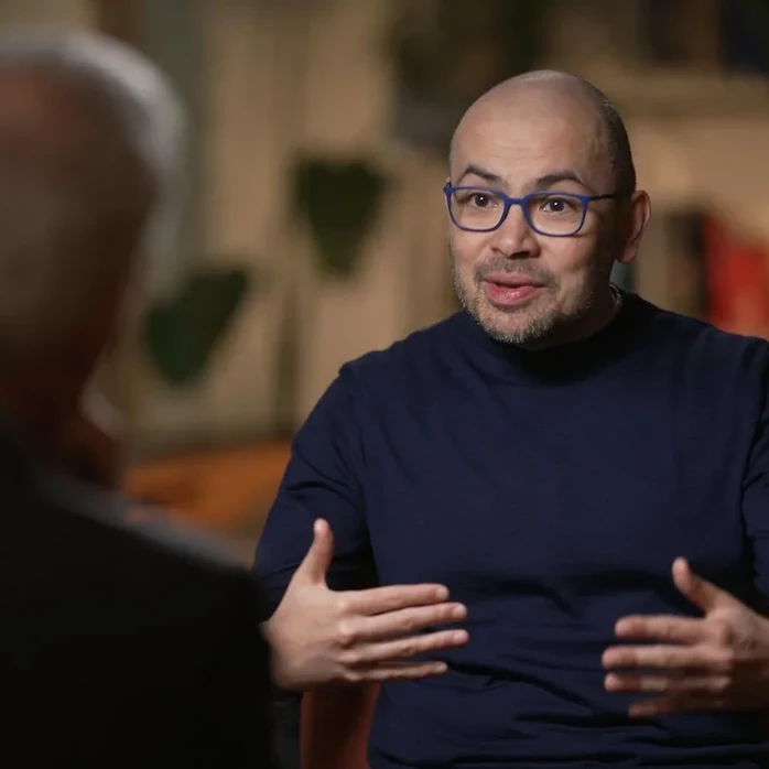 A snapshot of Google DeepMind CEO Demis Hassabis in an interview with 60 Minutes reporter